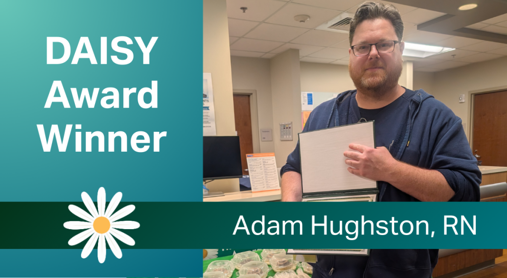 A man stands in a hospital setting holding a DAISY Award certificate. Text reads, "DAISY Award Winner, Adam Hughston, RN." The tone is celebratory.
